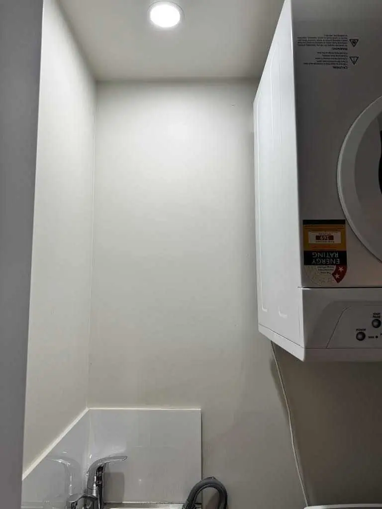 Bright laundry with new cabinetry