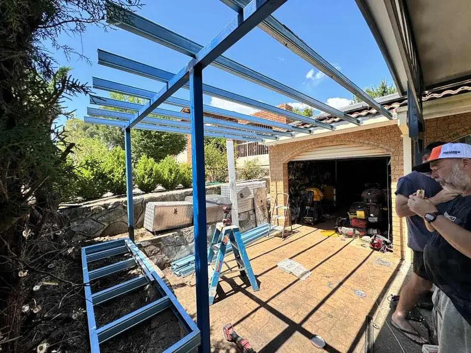 Steel frame and roof battens for an outdoor workshop
